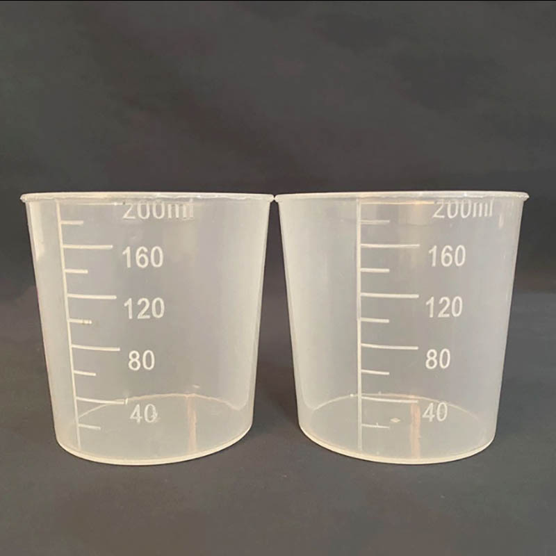 Moulage de tasse à mesurer en plastique